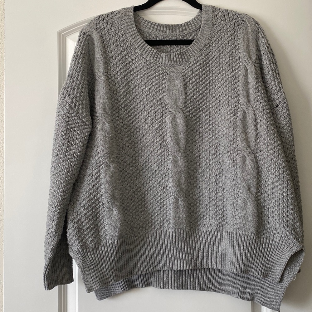 Large cable knit sweater